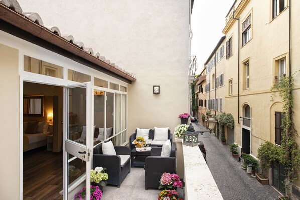 Deluxe vierpersoonskamer, terras | Terras