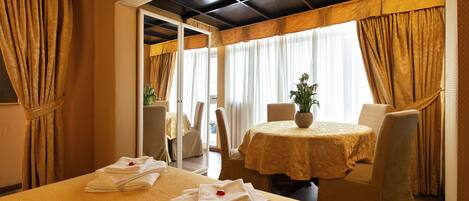 Deluxe Suite, Terrace | Free minibar, in-room safe, desk, blackout curtains