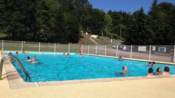 Seasonal outdoor pool, a heated pool, sun loungers