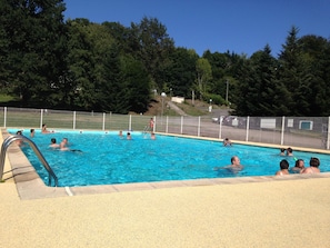 Seasonal outdoor pool, a heated pool, pool loungers