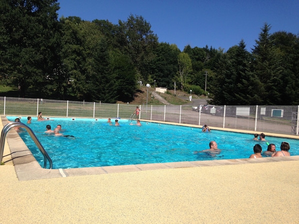 Seasonal outdoor pool, a heated pool, pool loungers
