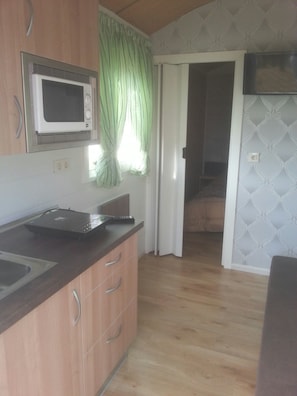 Cabana, banheiro compartilhado, vista para o rio | Cozinha privada