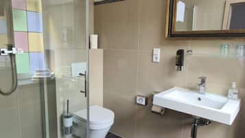 Shower, free toiletries, hair dryer, towels