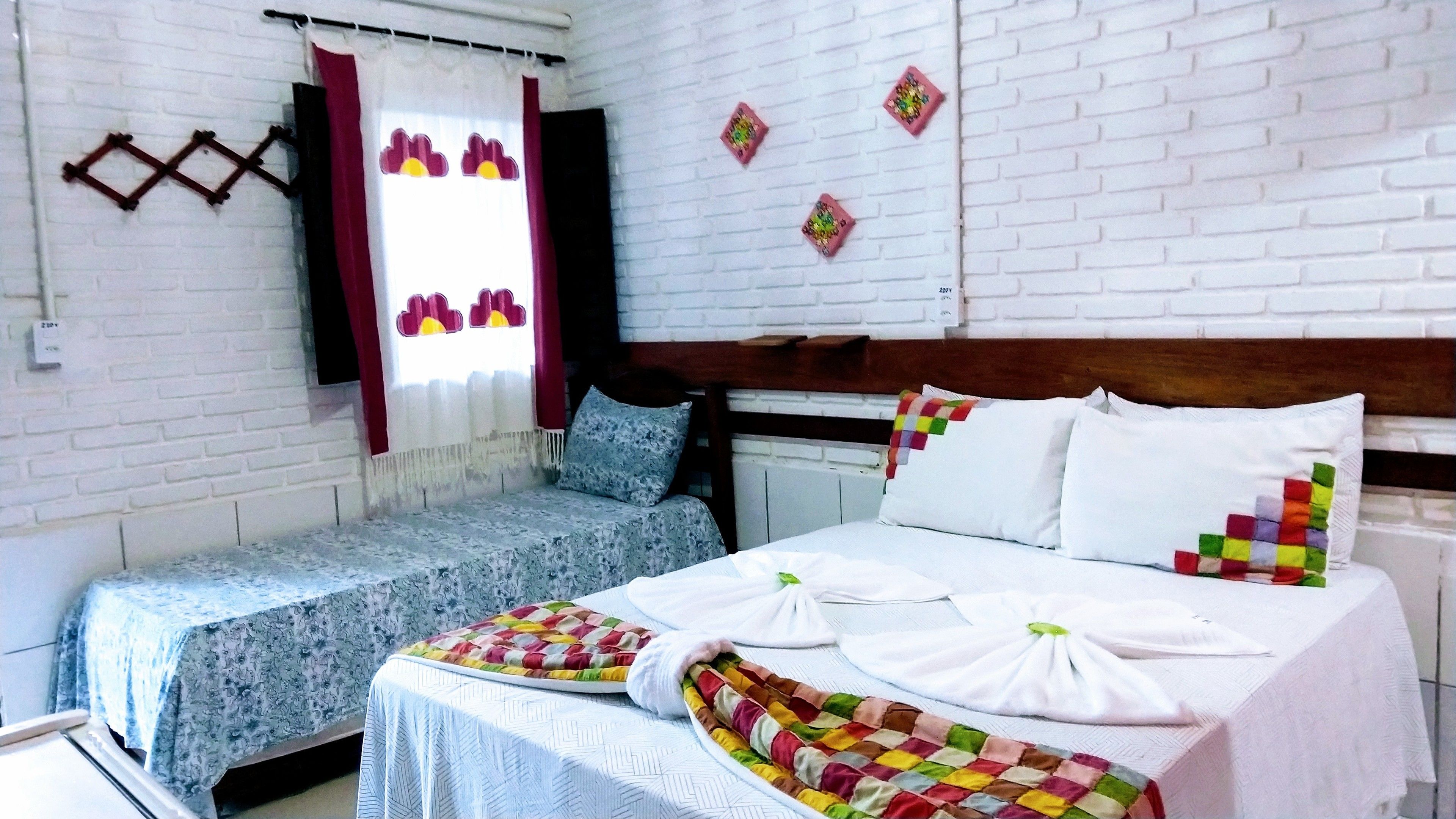 Apartamento standard | Frigobar, ferros/tábuas de passar roupa, Wi-Fi de cortesia