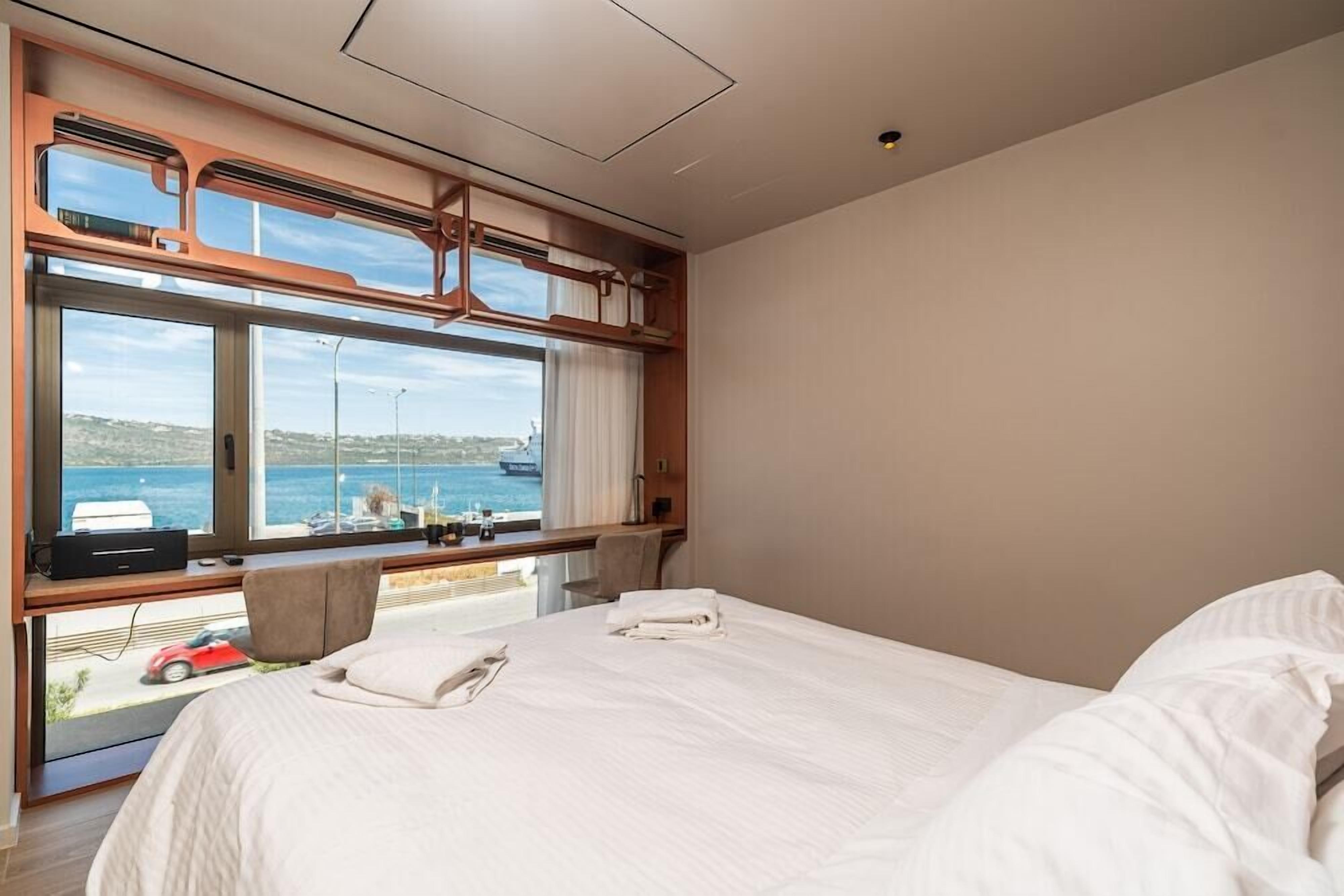 Premium bedding, pillowtop beds, minibar, in-room safe