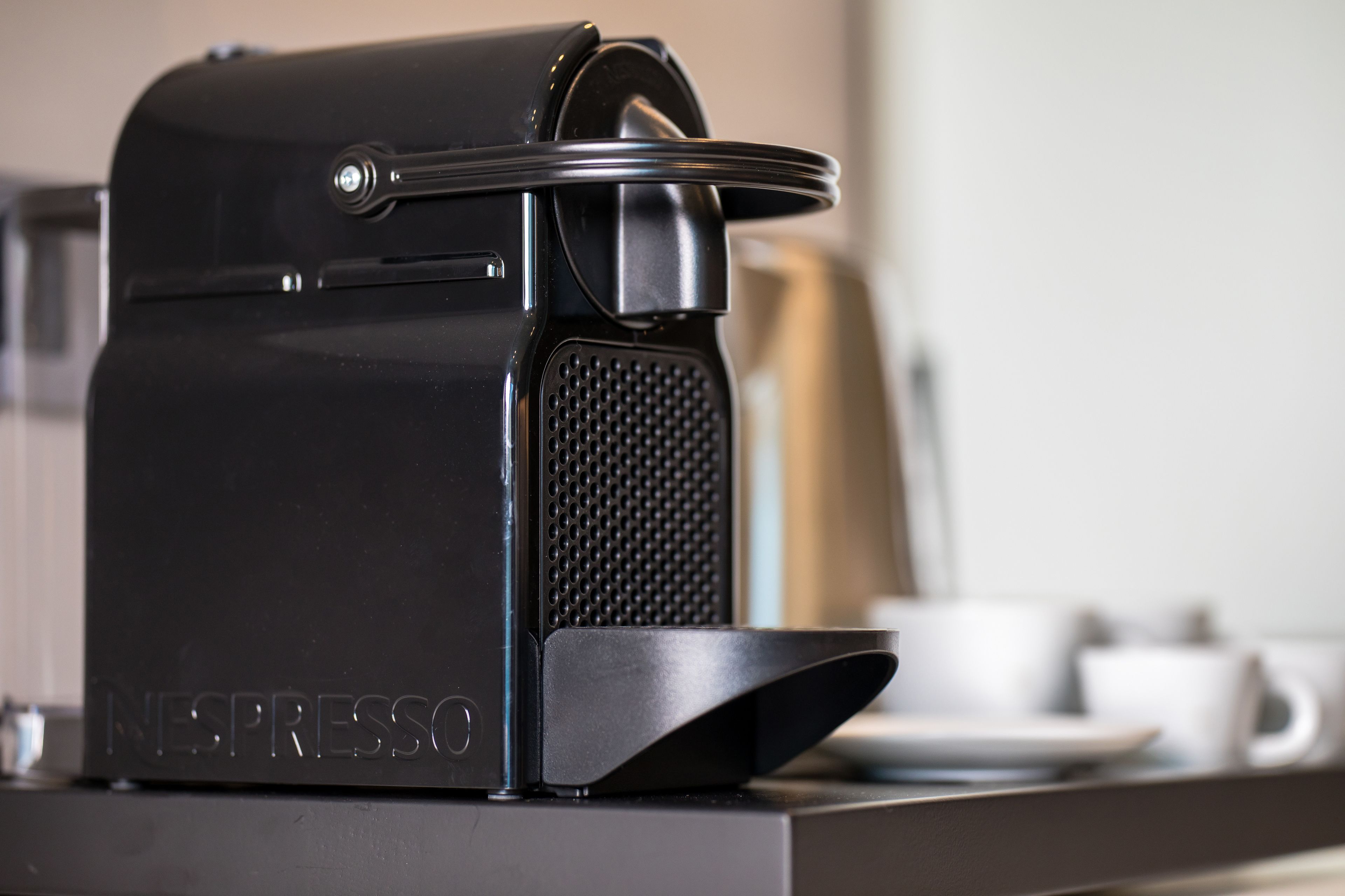 A Nespresso coffee machine on a kitchen counter.