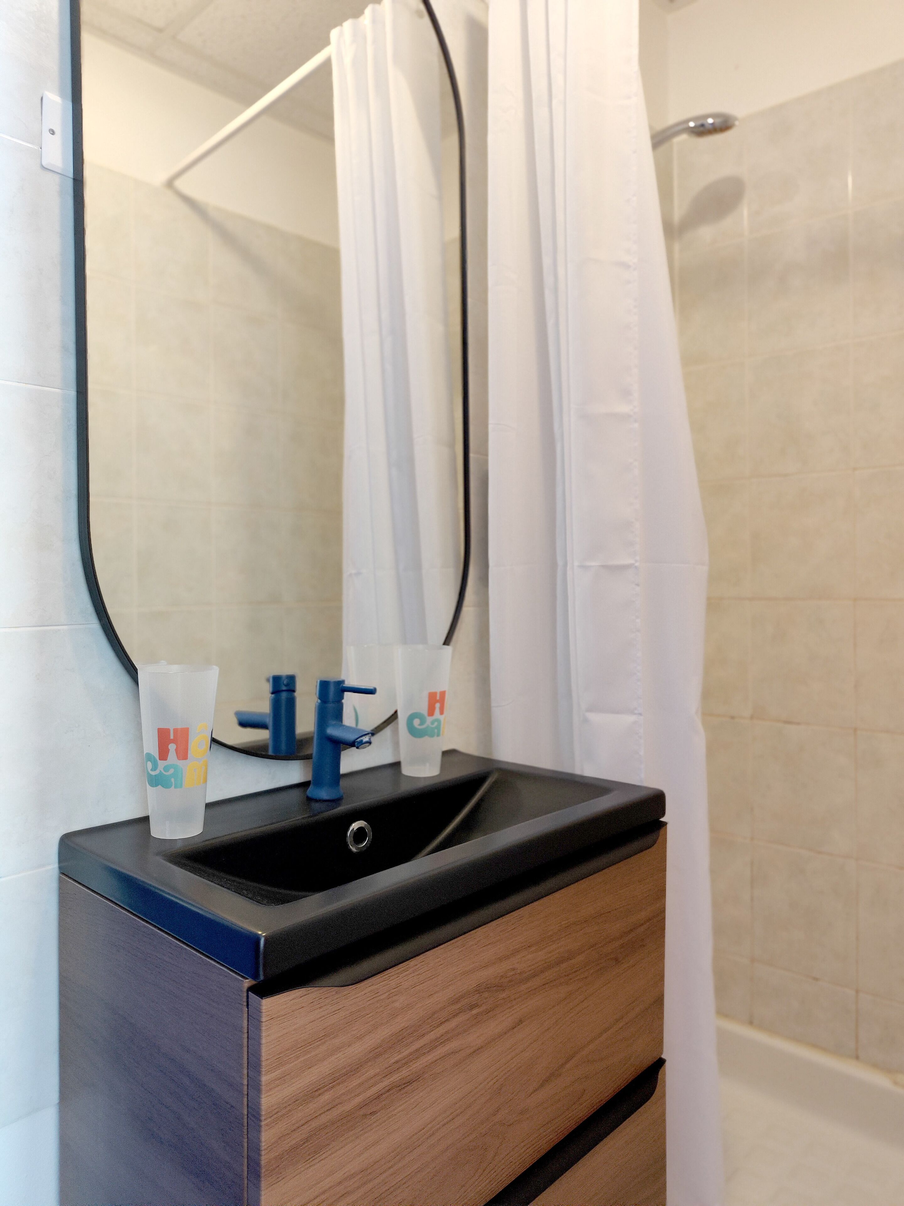 economy room | bathroom | shower, free toiletries, hair dryer, towels