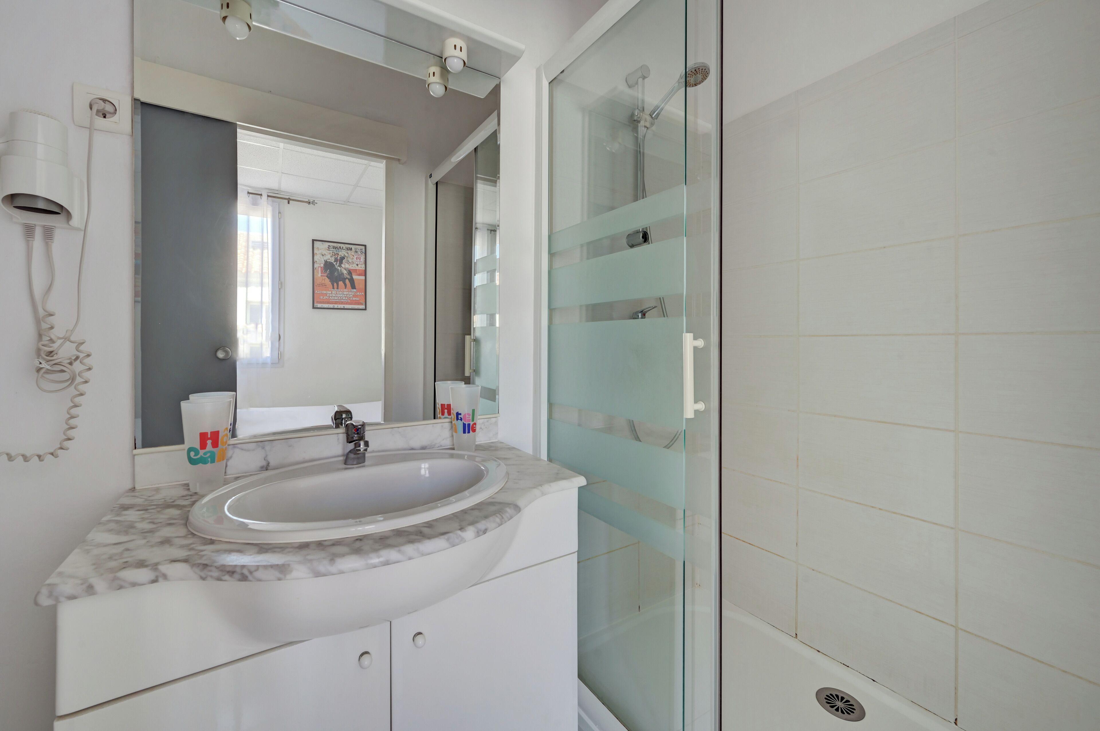 shower, free toiletries, hair dryer, towels