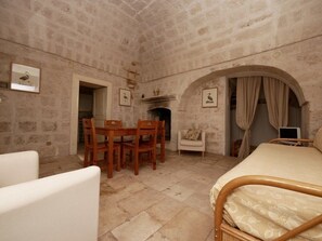 Apartment, 2 Bedrooms | Living area | Flat-screen TV, fireplace - Masseria Maccarone (Fasano)