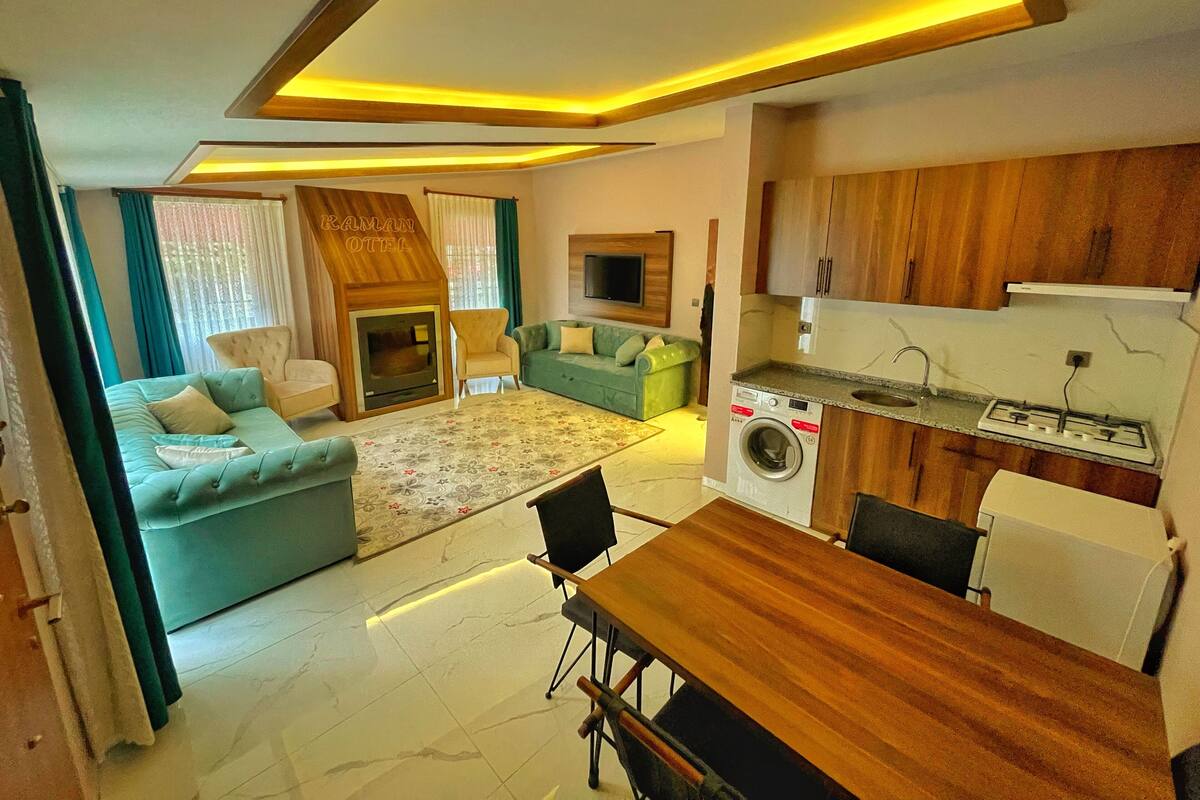 Deluxe Condo, 1 Bedroom | Living area | LCD TV