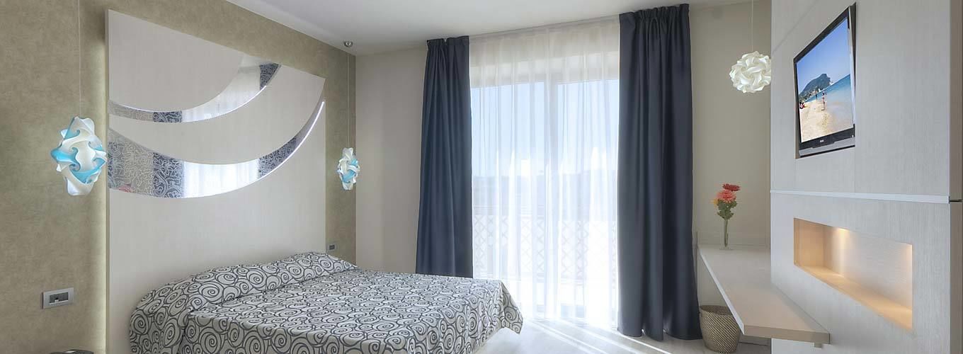 double or twin room | in-room safe, desk, laptop workspace, blackout curtains