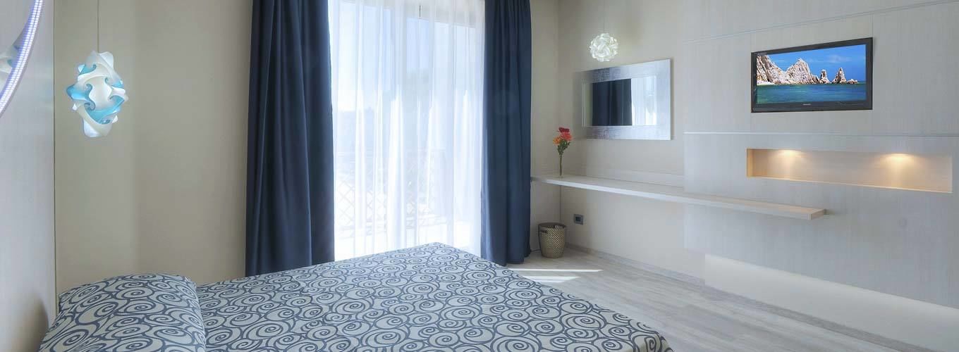 double or twin room | in-room safe, desk, laptop workspace, blackout curtains