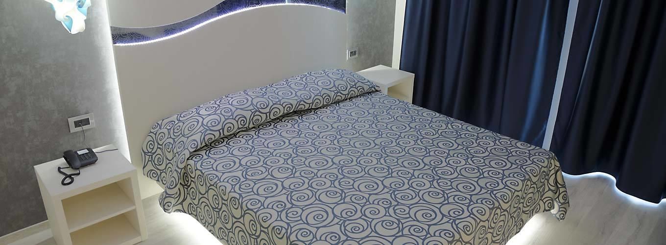 double or twin room | in-room safe, desk, laptop workspace, blackout curtains