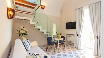 Standaard kamer | Woonruimte | Flatscreentelevisie en een iPod-dock