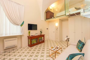 普通套房 | 起居區 | 平面電視、iPod 底座