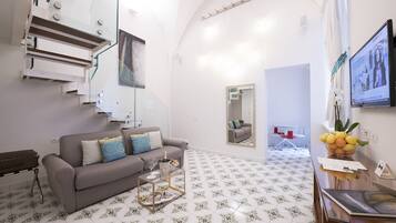 Junior Suite | Living area | Flat-screen TV, iPod dock