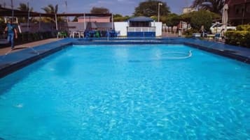 Outdoor pool, pool umbrellas, sun loungers