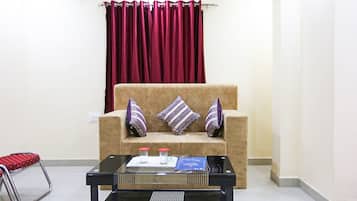 Double or Twin Room | Living area | Flat-screen TV