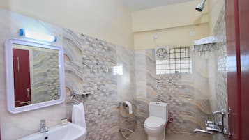 Standard Double Room | Bathroom | Deep-soaking bathtub, rainfall showerhead, free toiletries, towels