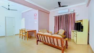 Double or Twin Room | Living area | TV