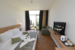 Room, Garden Area | Minibar, in-room safe, desk, free WiFi