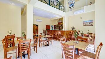 Breakfast, lunch, dinner served; local and international cuisine