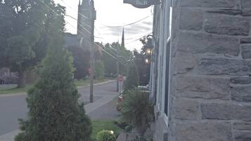 A stone building with a sign reading "Sir Isaac Brock B&B".