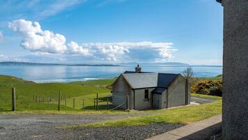 Traditionele cottage, 1 kingsize bed, uitzicht op zee | Uitzicht op het water