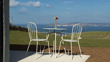 Casa de campo tradicional, 1 cama King size, vista al océano | Terraza o patio