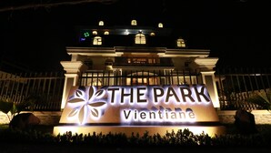 A sign for "The Park Vientiane" with illuminated letters and a decorative design. - The Park Vientiane (Vientiane)
