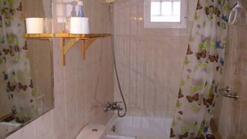 Quadruple Room, Mountain View | Bathroom | Rainfall showerhead, free toiletries, towels