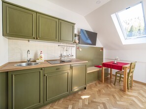 Studio (2 Adults) | Private kitchen | Fridge, coffee/tea maker, electric kettle, dining tables - Berghi Hotel and Apartments (Kranjska Gora)