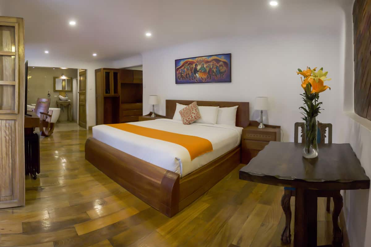 Deluxe Room, 1 King Bed | Down comforters, in-room safe, desk, laptop workspace
