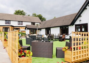 Chambre Deluxe, 1 très grand lit, vue jardin | Terrasse/Patio