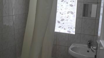 Classic Apartment, 2 Bedrooms, City View | Bathroom | Combined shower/tub, free toiletries, hair dryer, towels