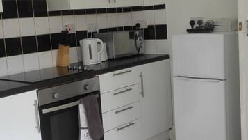 Classic Apartment, 2 Bedrooms, City View | Private kitchen | Fridge, microwave, coffee/tea maker, electric kettle