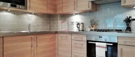 Executive Apartment, 1 Bedroom | Private kitchen | Full-sized fridge, microwave, oven, stovetop