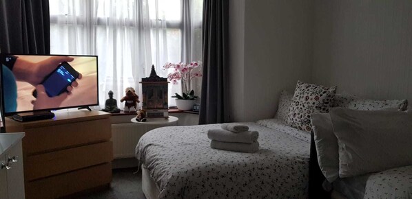 Blackout curtains, iron/ironing board, free WiFi, bed sheets