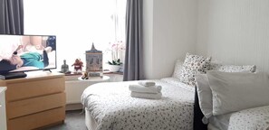 Blackout curtains, iron/ironing board, free WiFi, bed sheets