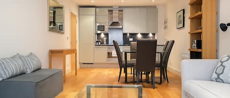 Executive Apartment, 1 Bedroom | Living area | Flat-screen TV