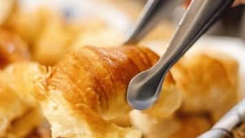 A basket containing croissants.