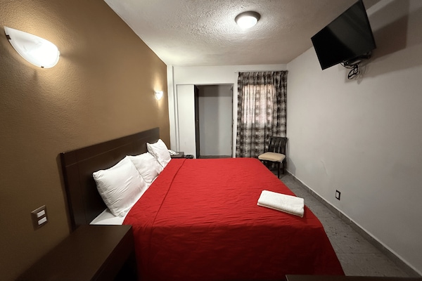 Habitación individual | Cortinas opacas, tabla de planchar con plancha, wifi gratis