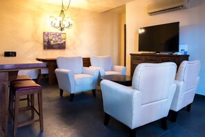 Family Villa, 2 Bedrooms | Living room | Flat-screen TV - FN535-Loreto Bay-Luxury Villa, next to Lap Pool (Loreto)