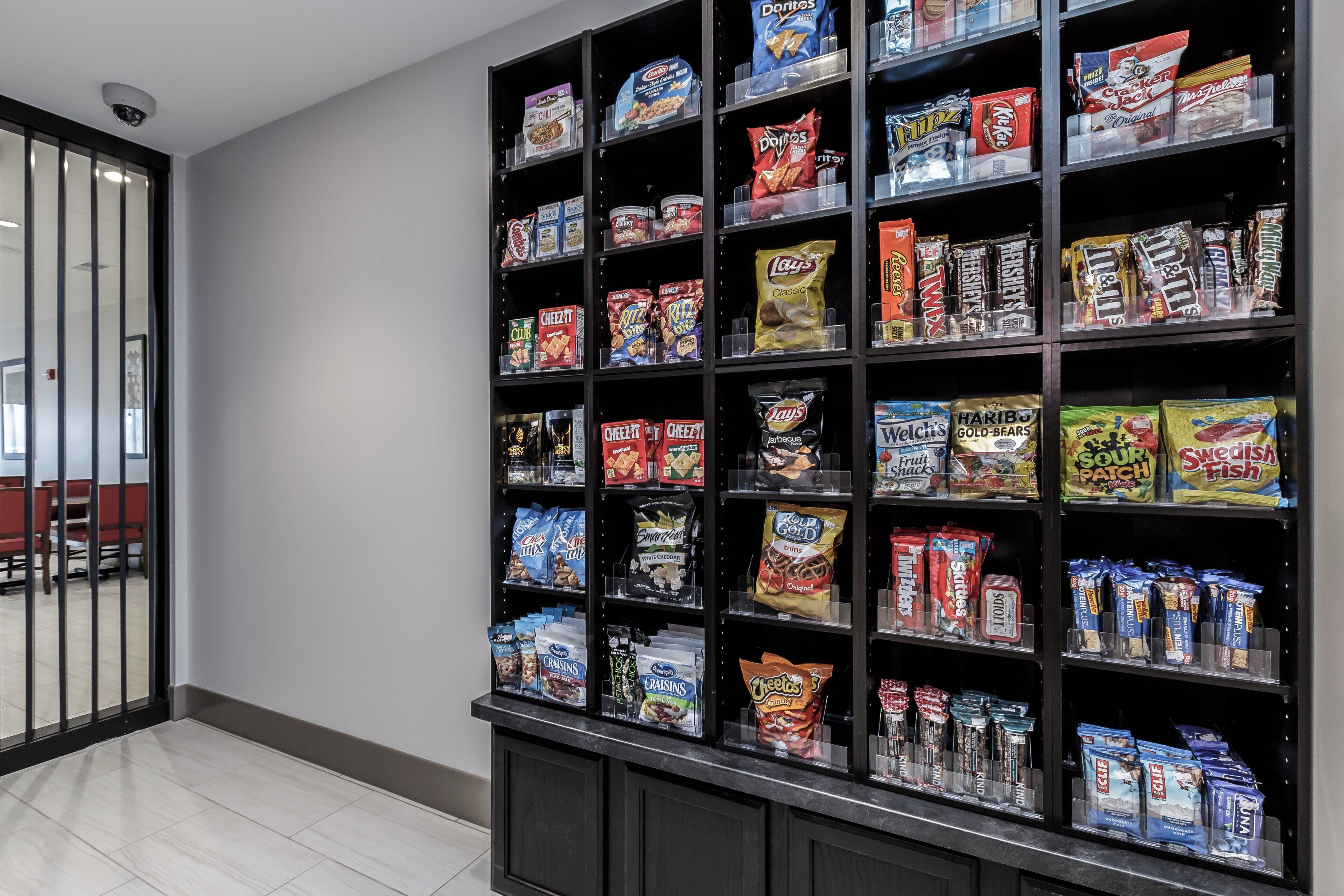 A snack display with various packaged foods.