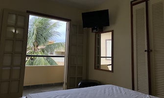 Family Room, Connecting Rooms | Minibar, in-room safe, desk, bed sheets