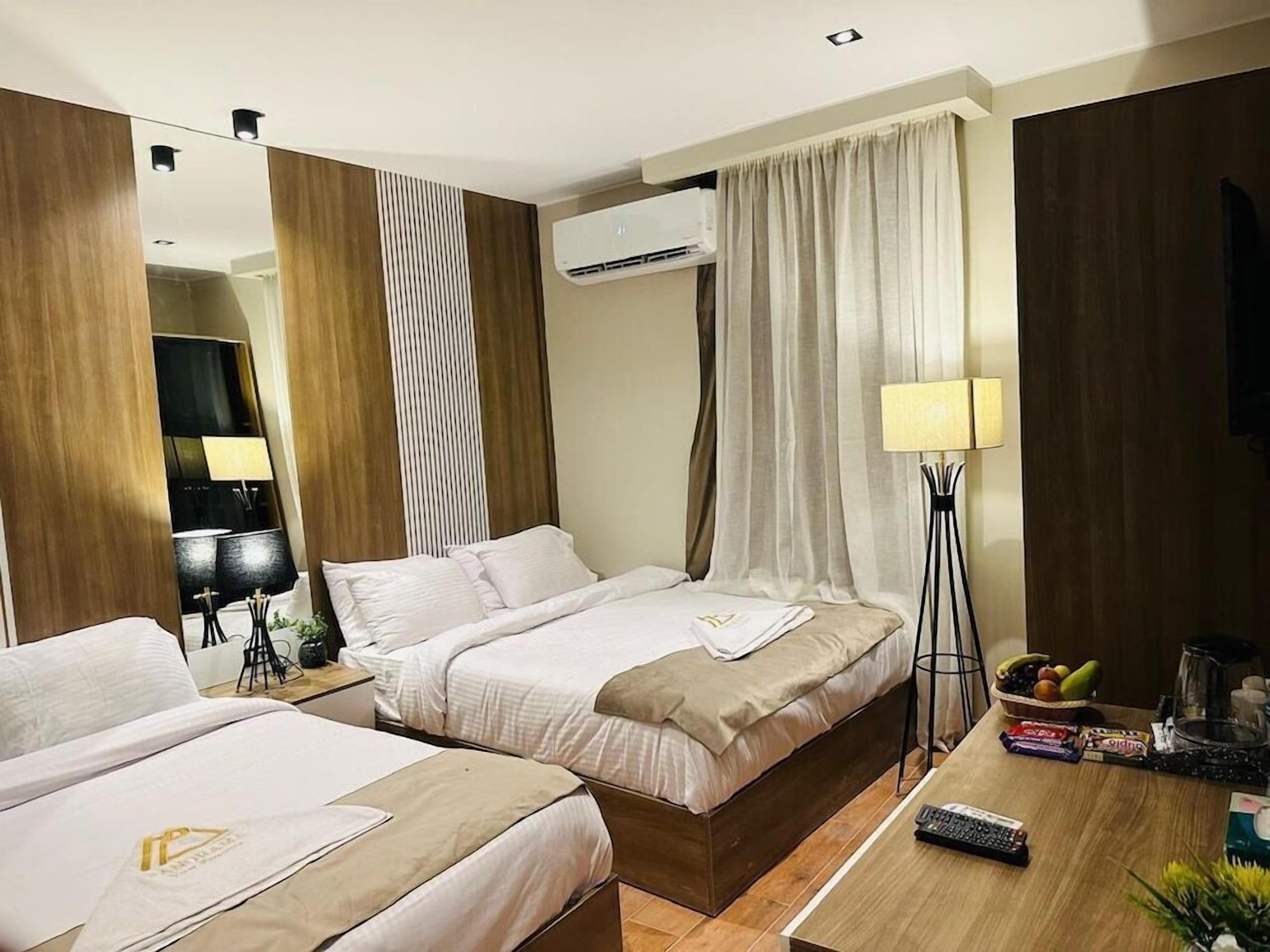 Select Comfort beds, minibar, blackout drapes, iron/ironing board