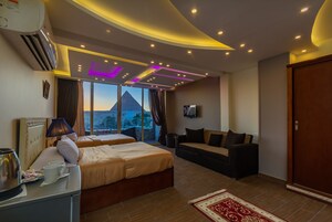 Luxury Suite | Select Comfort beds, minibar, blackout drapes, iron/ironing board