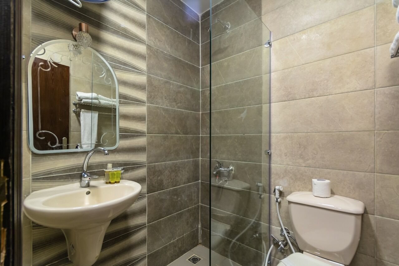 Bathroom | Shower, free toiletries, hair dryer, bathrobes
