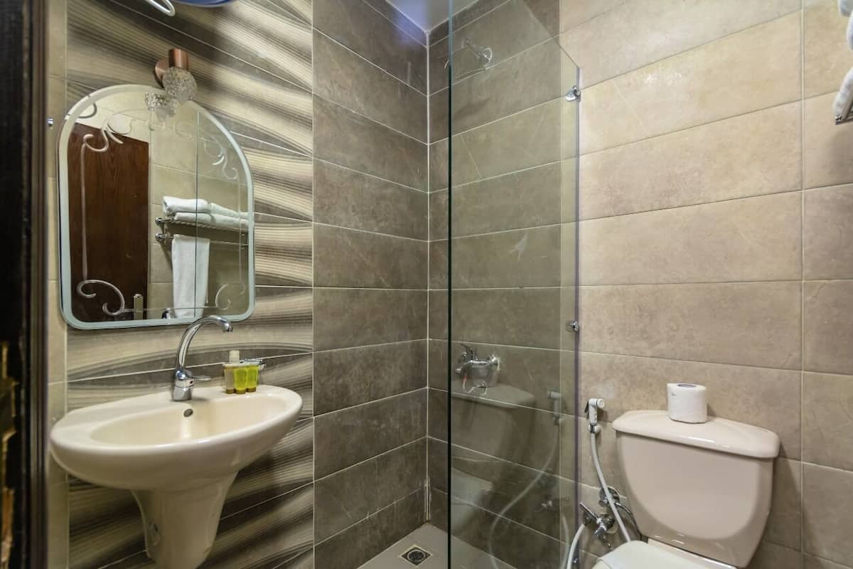 Bathroom | Shower, free toiletries, hair dryer, bathrobes