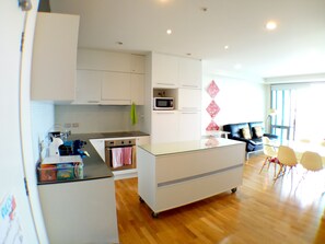 Comfort Apartment, 2 Bedrooms, Accessible, Sea View | Living area | Flat-screen TV